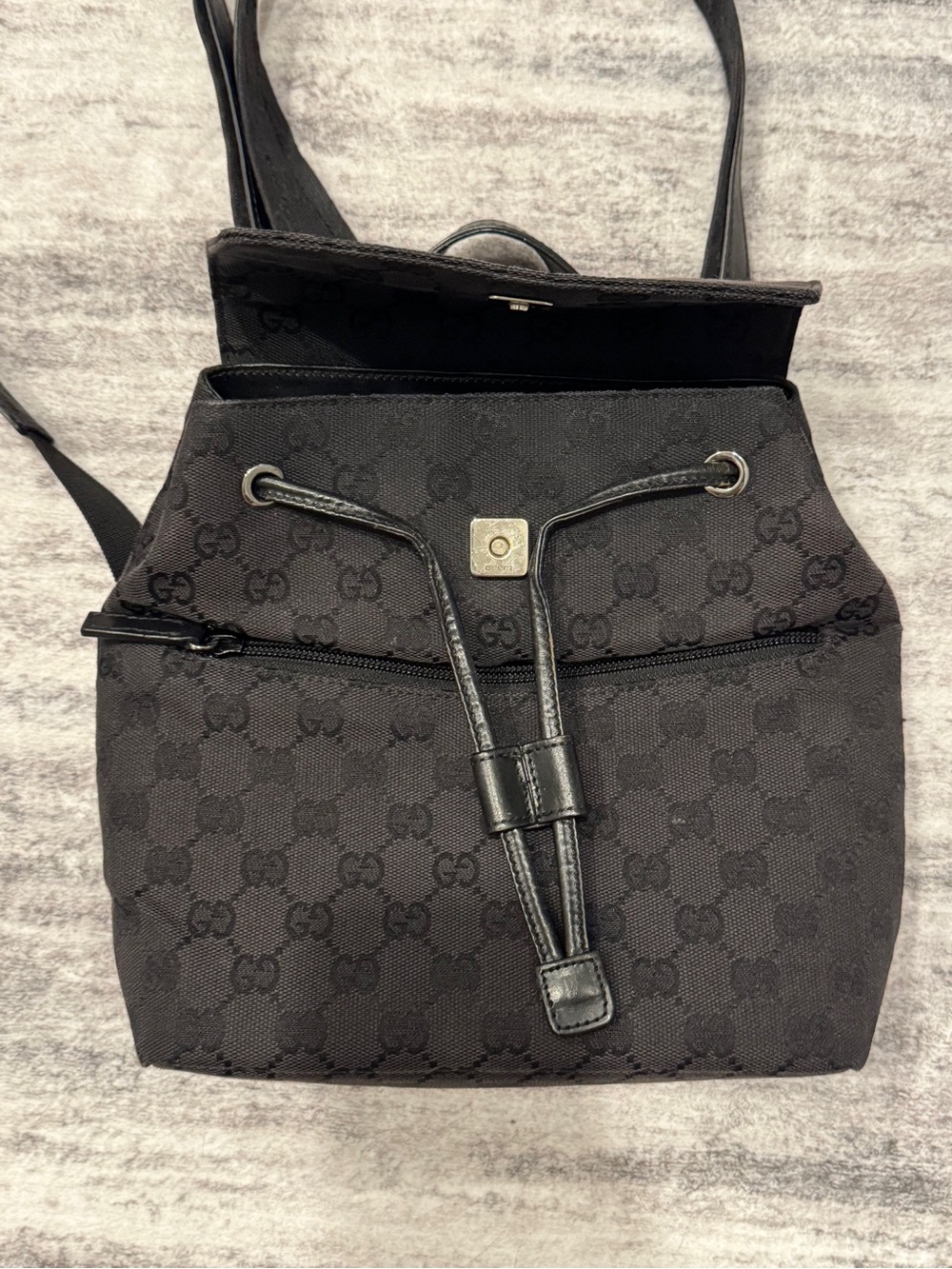Authentic, Vintage Gucci Black Monogram Drawstring Backpack with Front Zip